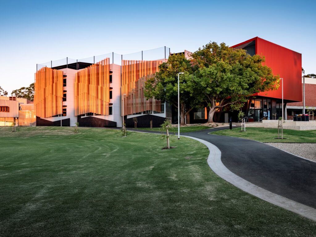 Early morning view casting shadows on Norwood International High School